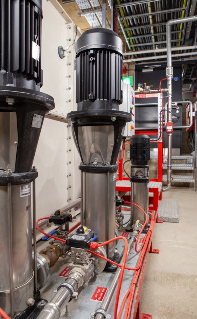 Public health pipework in a plant room
